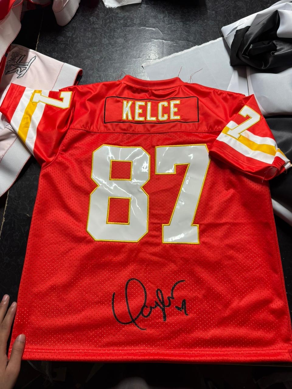 Kelce #87 signed red custom fan jersey back